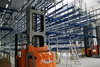 High Rack aisle with Order Picking Stacker Trucks