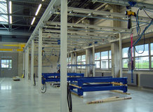 Overhead Monorail System with shifting bridge in a painting plant with pneumatic swivels